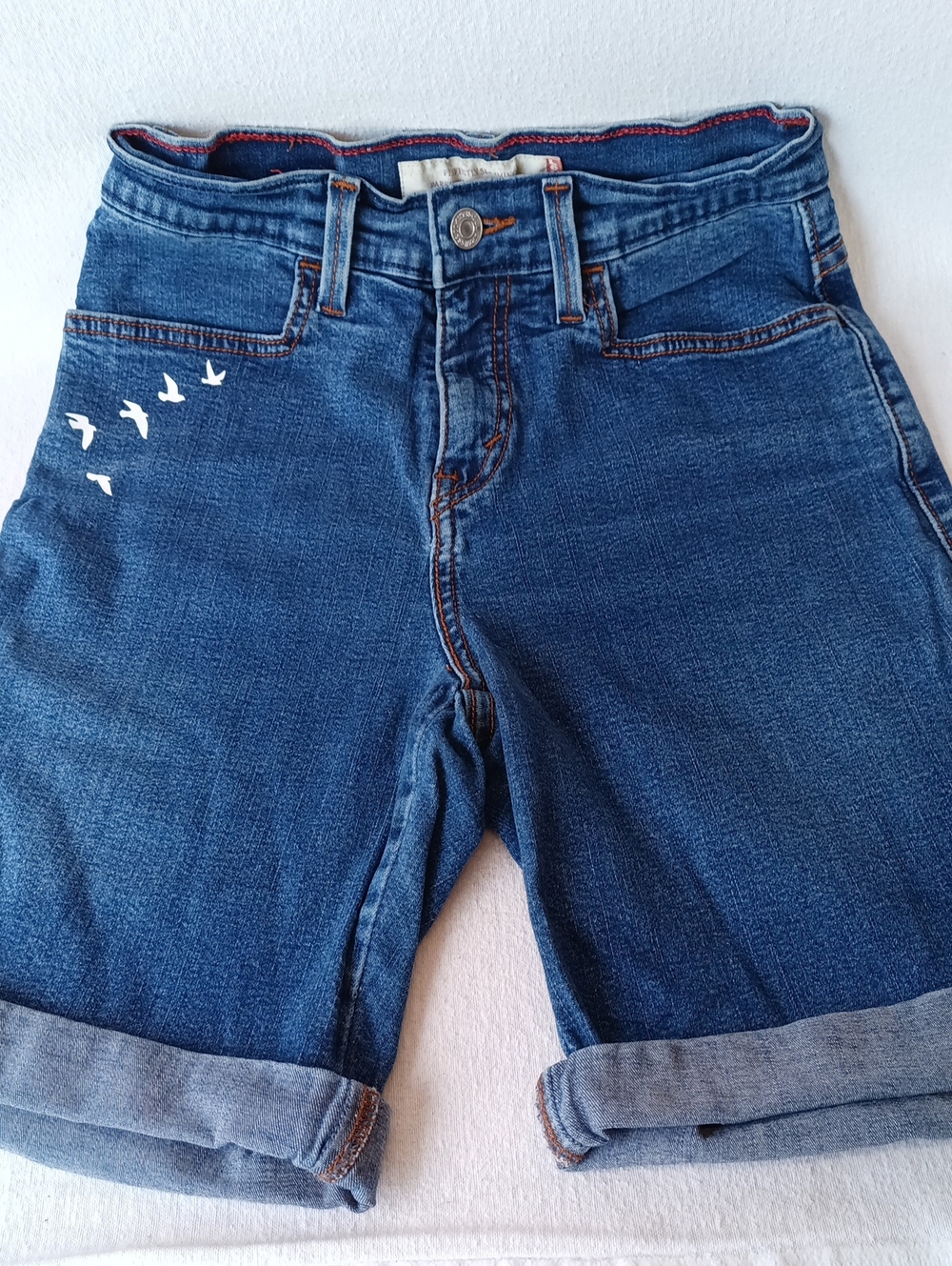 Levi's Blue Rolled-Hem Women's Denim Bermuda Shorts With White Bird Graphics